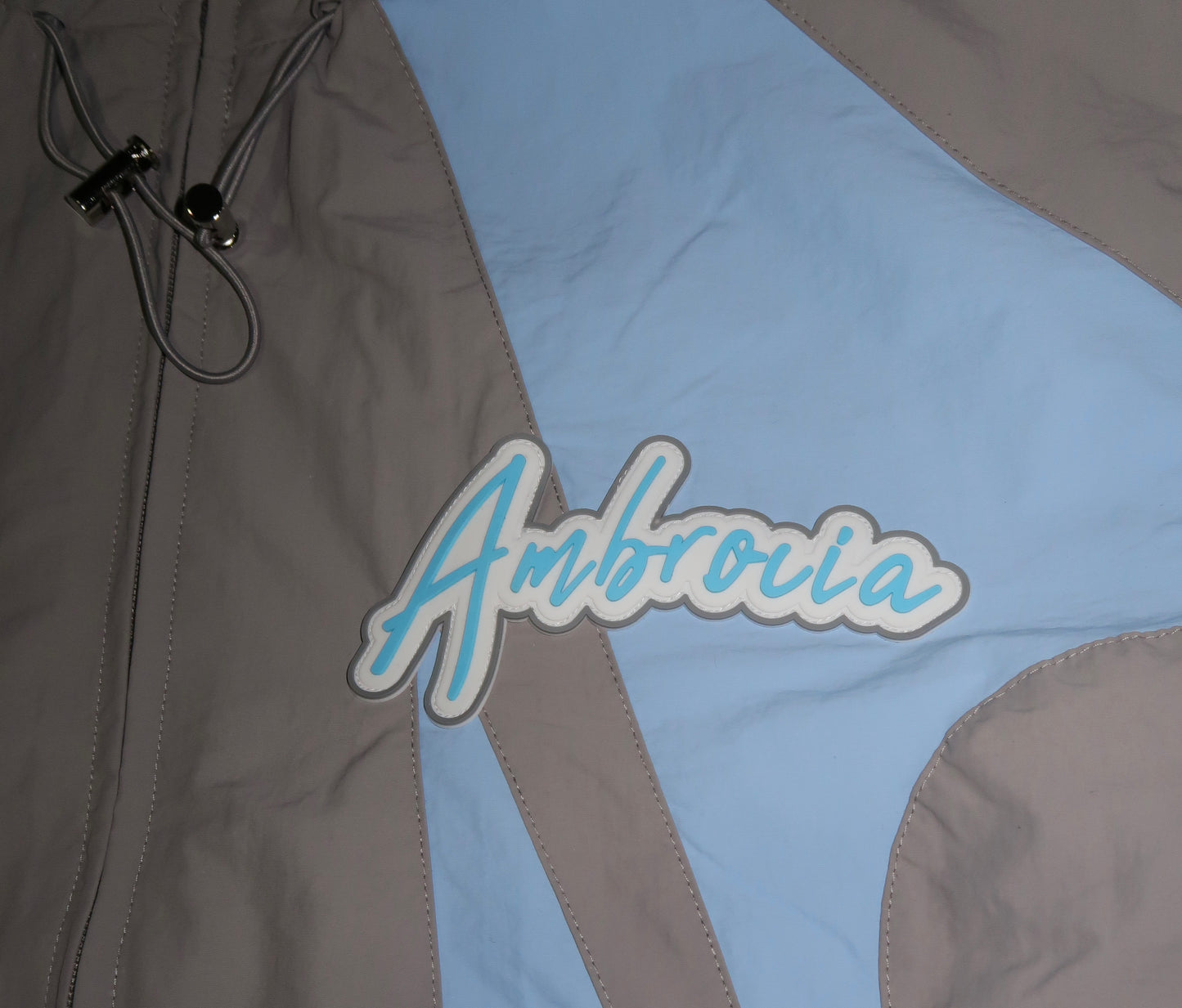 PANEL WINDBREAKER ZIP UP