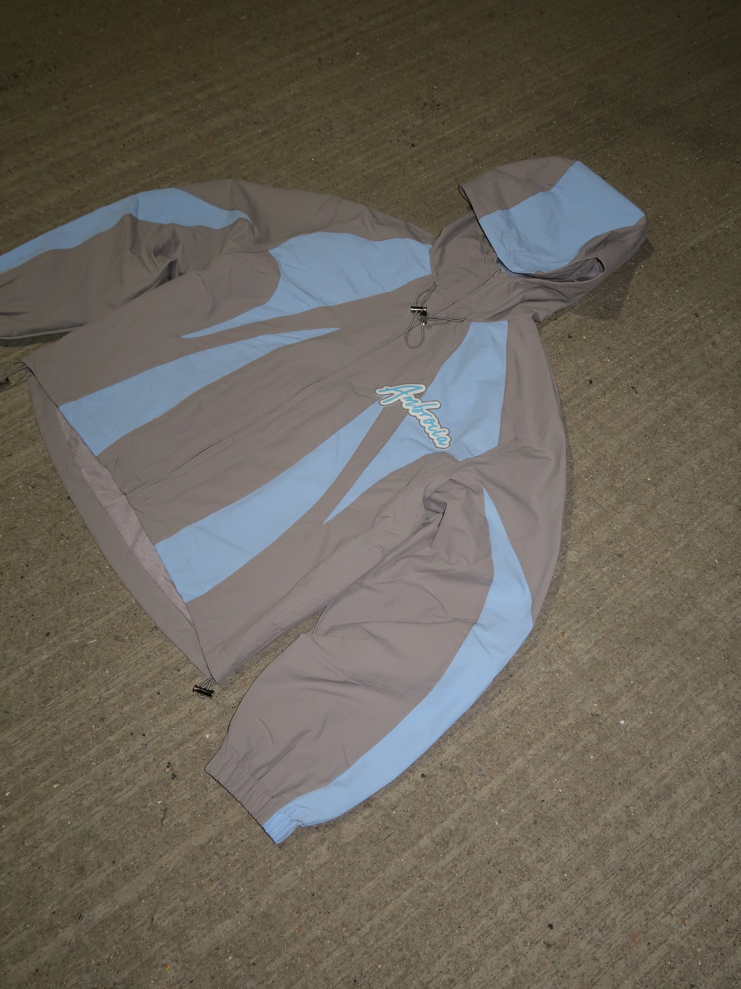 PANEL WINDBREAKER ZIP UP